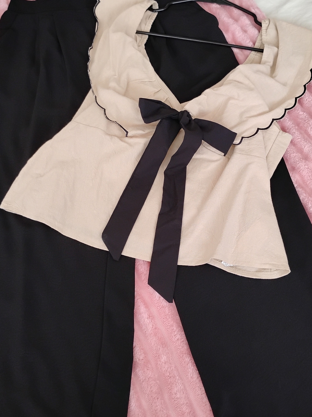 Beige Peplum Top with Black Bow Accent And Wide Leg Pants